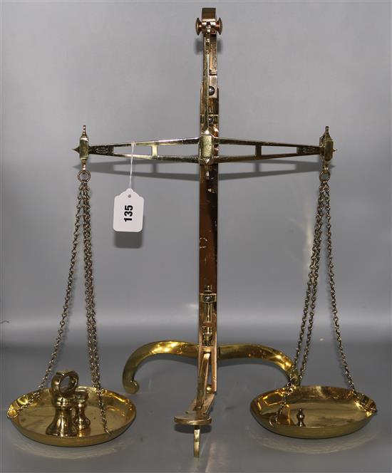 Brass bank scales, plus weights